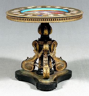 Appraisal: S vres and ormolu center table tabletop fitted with central