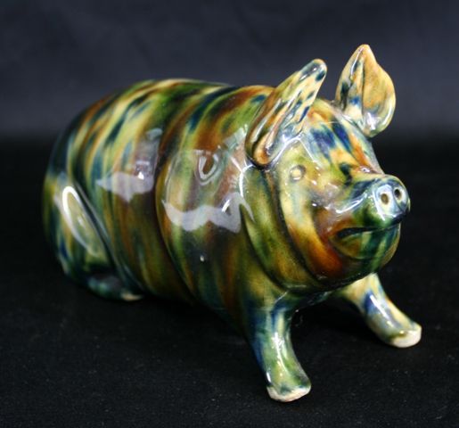 Appraisal: A Mashman figure of a seated pig cm high