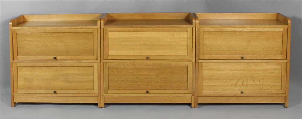 Appraisal: SET OF THREE BLEACHED OAK BARRISTER BOOKCASES EN SUITE each