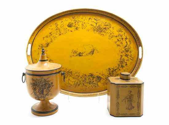 Appraisal: Three Yellow Tole Decorative Articles comprising a covered urn a