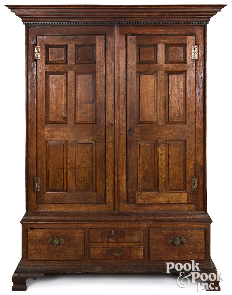 Appraisal: Pennsylvania walnut schrank late th c Pennsylvania walnut schrank late