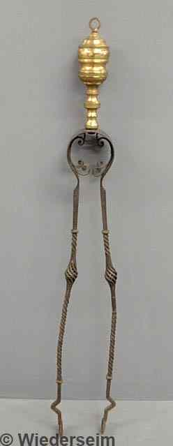 Appraisal: Wrought iron fireplace tongs with brass handle h