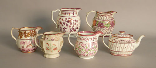 Appraisal: Three pink luster floral decorated pitchers a teapot and two