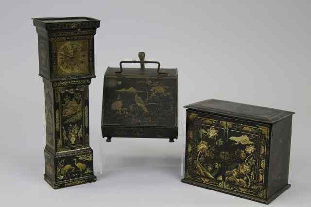 Appraisal: THREE FURNITURE FORM BISCUIT TINS lithographed tinplate depicting black lacquer