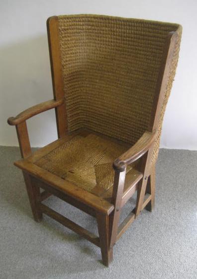 Appraisal: A CHILD'S OAK ORKNEY CHAIR th century with curved rush