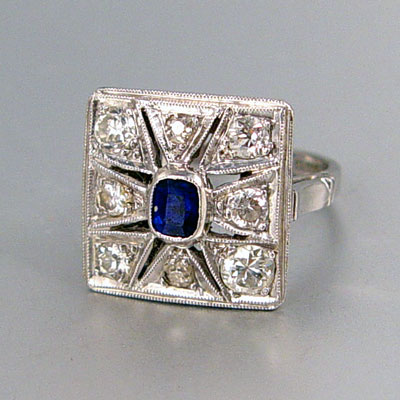 Appraisal: PLATINUM DIAMOND SAPPHIRE RING CA 'S Centering one oval shaped