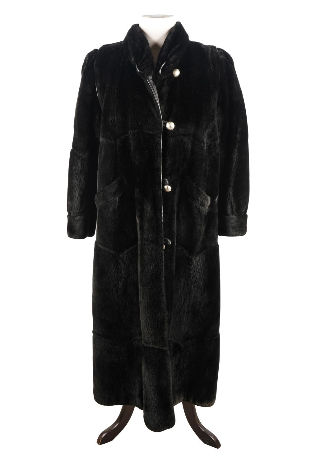 Appraisal: BLACK FUR COATno label embroidered W Dione to lining inches