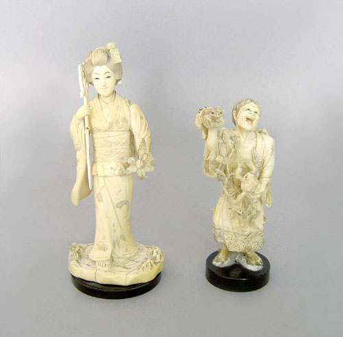 Appraisal: Two carved Japanese carved figures th c one of a