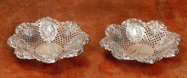 Appraisal: A PAIR OF LATE VICTORIAN SWEET MEAT DISHES with shaped