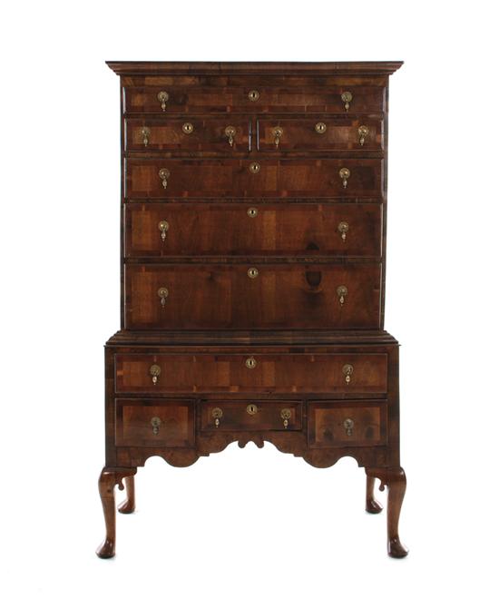 Appraisal: English walnut chest on stand th century upper case with