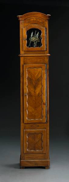 Appraisal: A Louis XV fruitwood tall case clock second half th