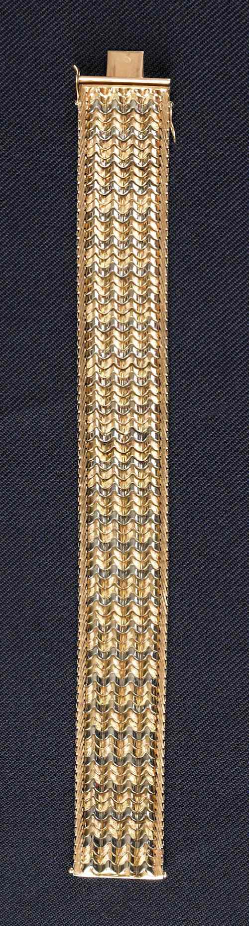 Appraisal: K multi-tone gold wide bracelet dwt