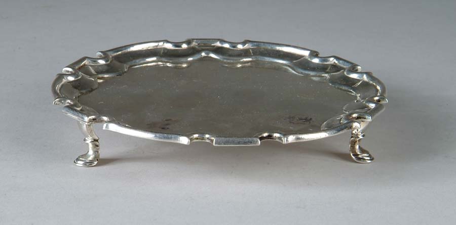 Appraisal: CHIPPENDALE SILVER TRAY Small silver tray has three animal hoof