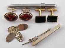 Appraisal: A mixed lot comprising a white metal tests silver tie