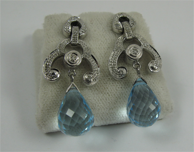 Appraisal: PAIR OF BLUE TOPAZ AND K GOLD EARRINGS Each -