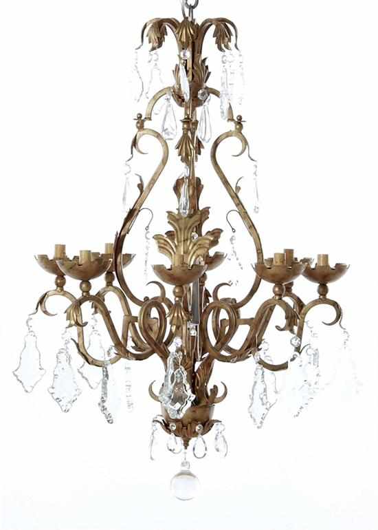 Appraisal: Arte de Mexico brass eight-light chandelier acanthus-adorned cage issuing scrolling