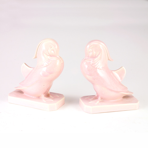 Appraisal: Villeroy and Boch puffin bookends covered in sheer pink glaze