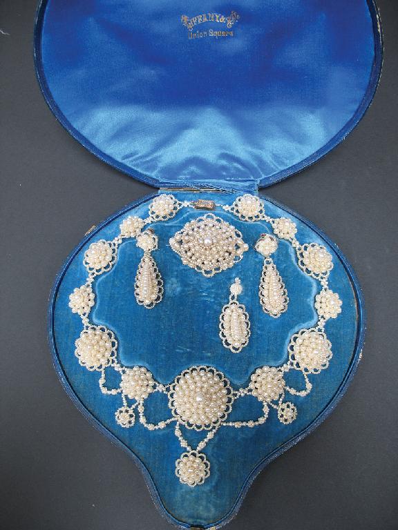 Appraisal: TIFFANY CO A TH CENTURY SEED PEARL PARURE of cluster