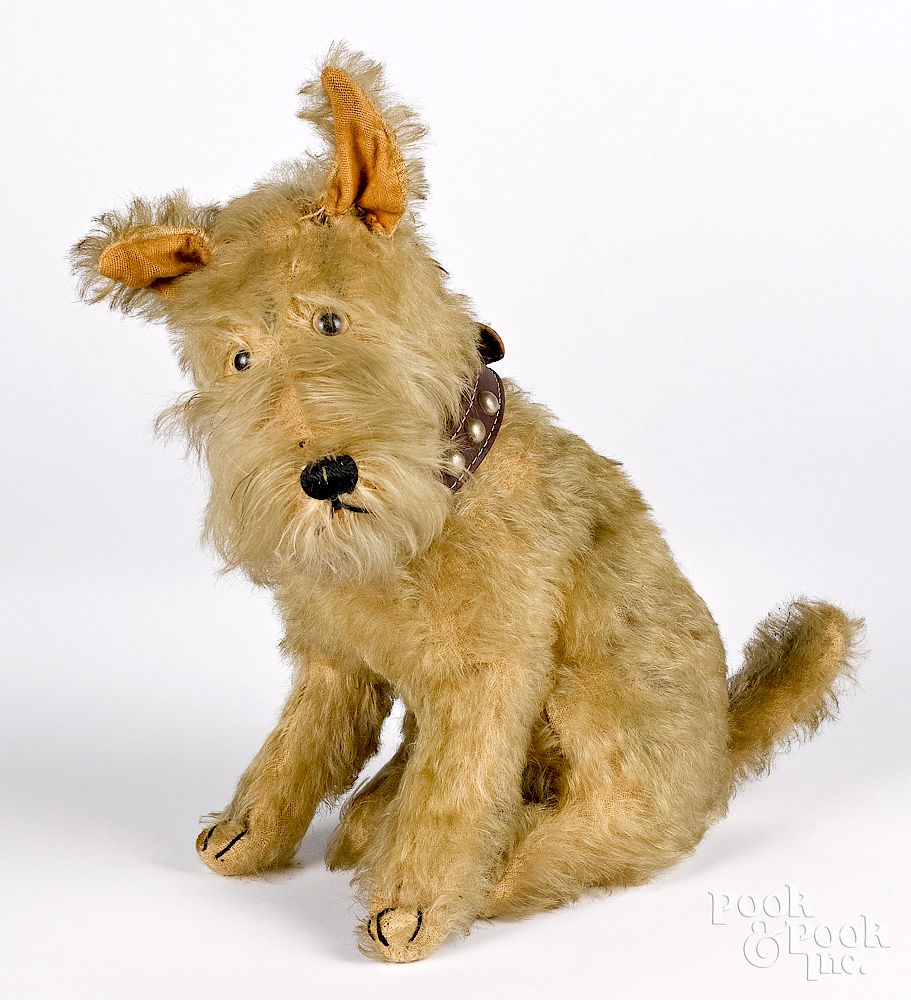 Appraisal: Seated terrier mohair dog Seated terrier mohair dog with glass