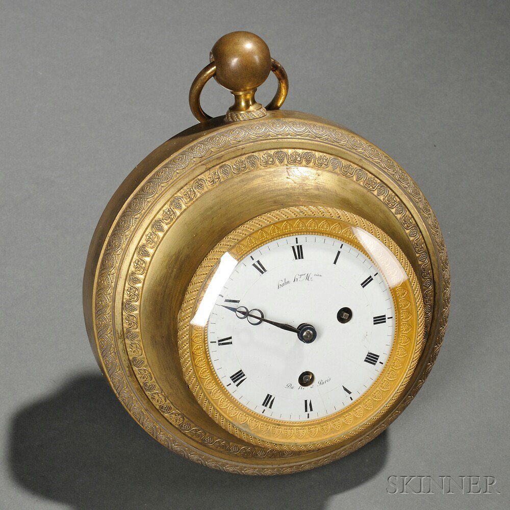 Appraisal: Gilt-bronze Wall Clock retailed in Paris th century the circular