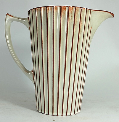 Appraisal: Wedgwood Studio ribbed brown white Jug designed by Norman Wilson