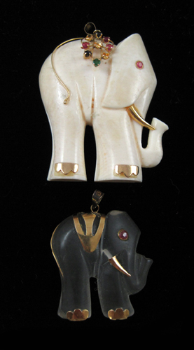 Appraisal: TWO FOURTEEN KARAT GOLD ELEPHANT PENDANTS the larger pendant set