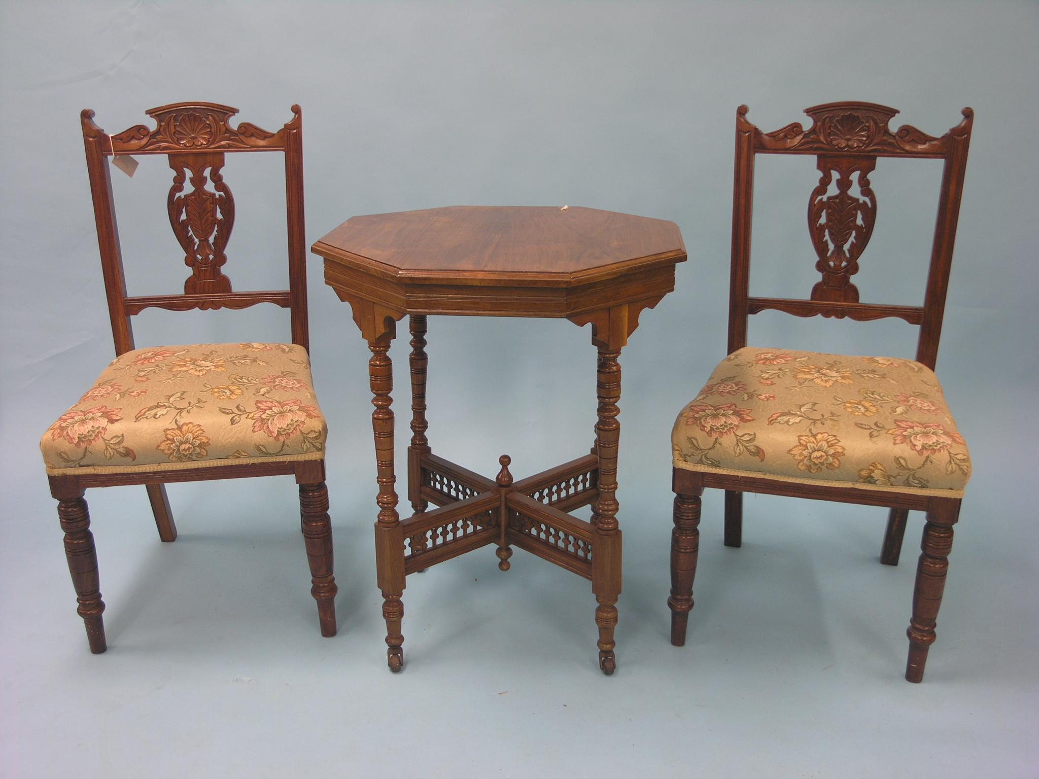 Appraisal: A late Victorian walnut occasional table octagonal-shape with turned underframe