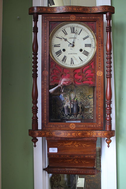 Appraisal: AN AMERICAN WALNUT WALL CLOCK with parquetry decoration and turned