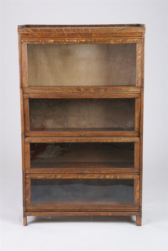 Appraisal: FOUR PANEL OAK BARRISTER BOOKCASE early th century Rectangular form