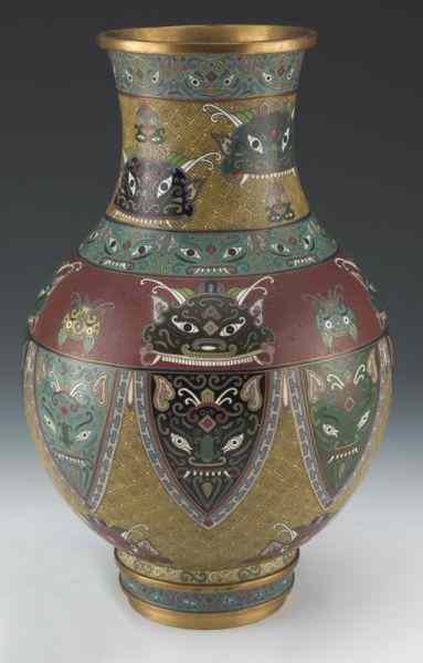 Appraisal: Chinese Qing Lao Tian Li cloisonne vasedepicting the face of