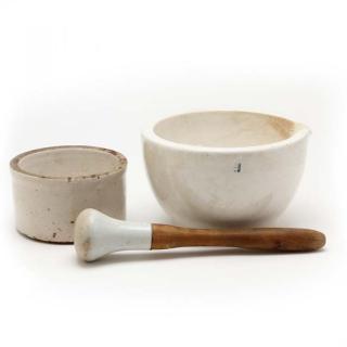 Appraisal: Two Vintage Stoneware Mortars with Pestle the larger mortar with