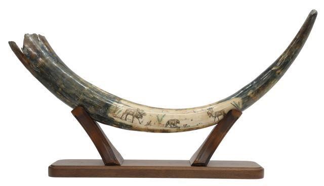 Appraisal: Mastodon tusk painted with an Alaska landscape depicting moose and