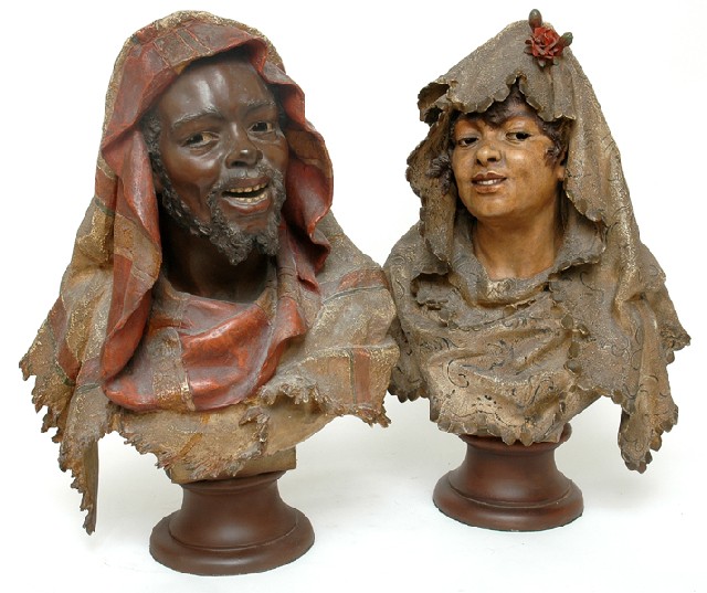 Appraisal: A PAIR OF BRONZED METAL BLACKAMOOR BUSTS Signed Foretay Paris