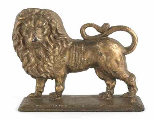 Appraisal: Cast iron lion form doorstop early th c with an