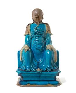 Appraisal: A Turquoise Glazed Biscuit Figure of a Daoist Immortal Zhenwu