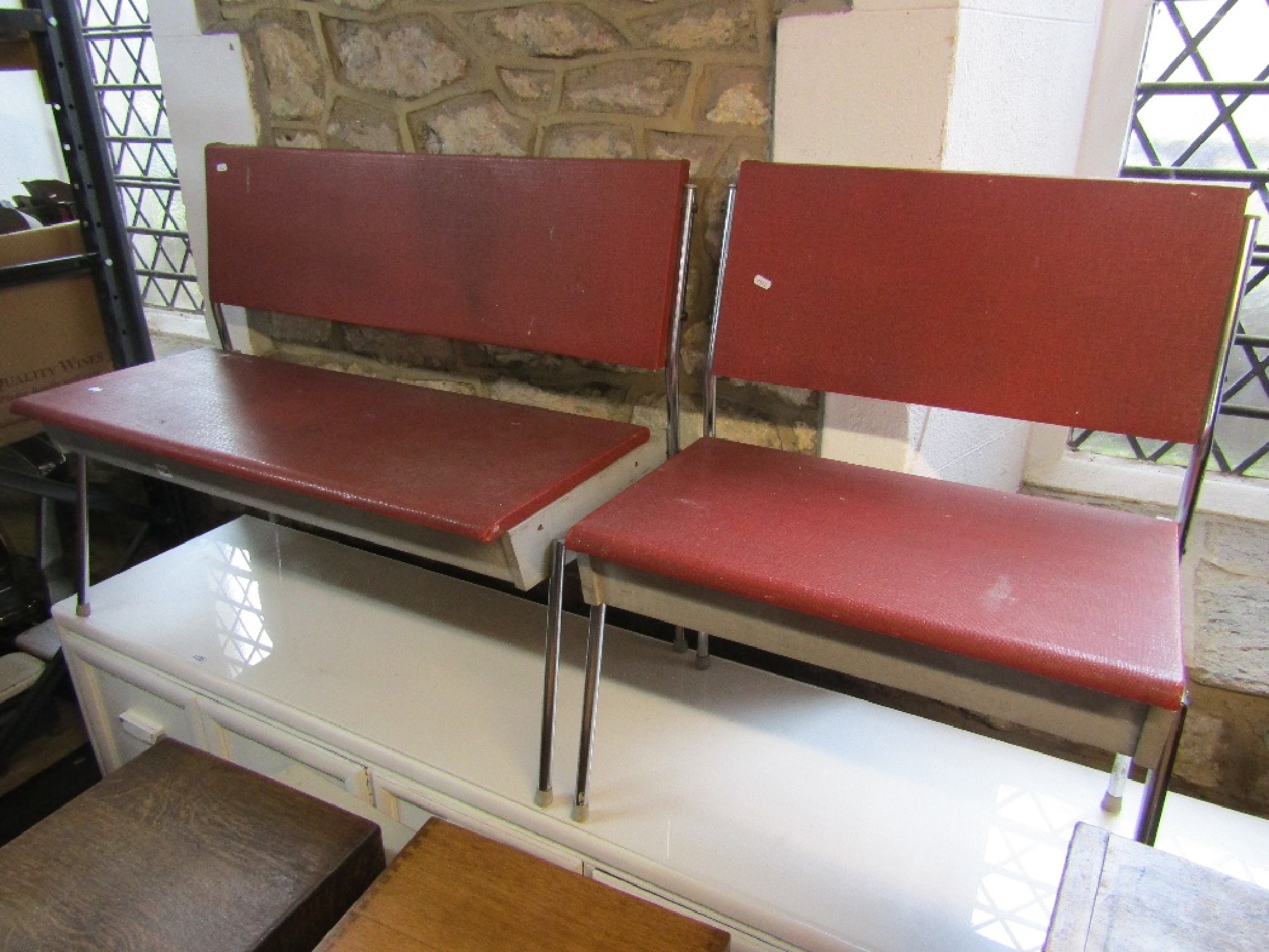 Appraisal: A mid th century tubular polished steel framed bench and