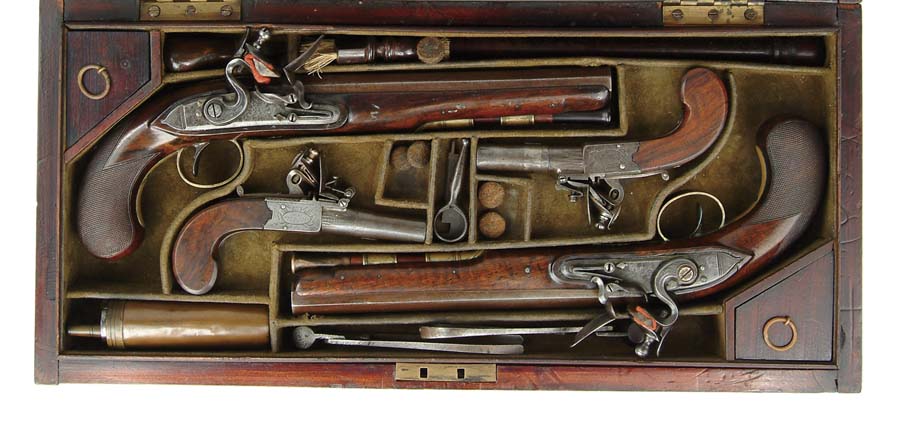 Appraisal: CASING CONTAINING TWO FLINTLOCK DUELING PISTOLS AND TWO SECONDS PISTOLS