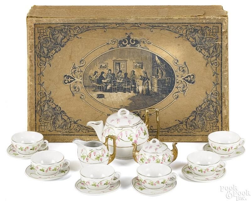 Appraisal: German child's' seventeen piece boxed tea set German seventeen piece