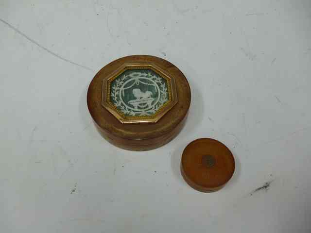 Appraisal: A GEORGIAN TORTOISESHELL CIRCULAR SNUFF BOX the lid with carved