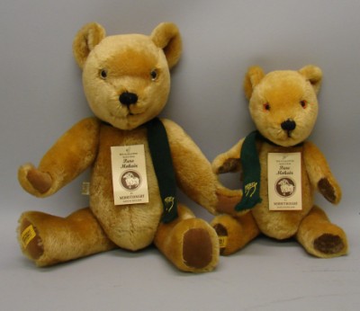 Appraisal: Pair of tagged English Merrythought gold mohair bears wearing green