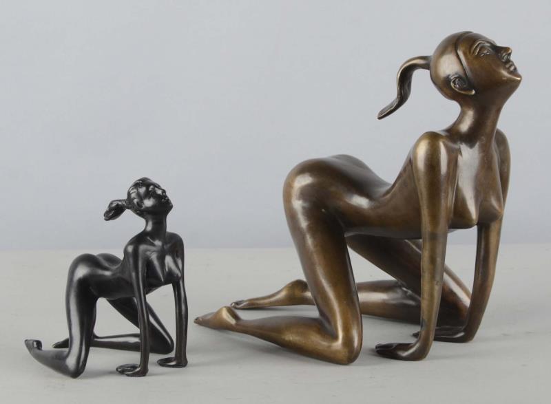 Appraisal: Lot Of Kneeling Nude Woman Statues Both sculptures are of