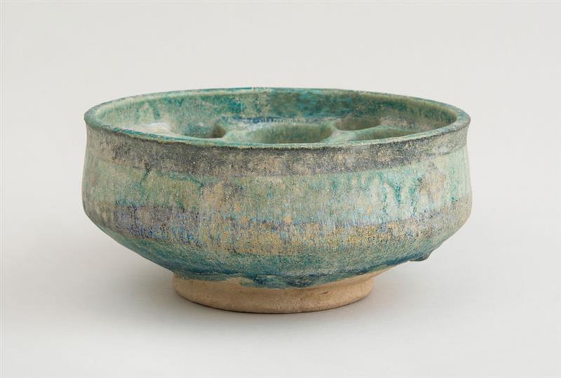 Appraisal: PERSIAN TURQUOISE GLAZED SEVEN CHAMBER WARMING BOWL x in diam