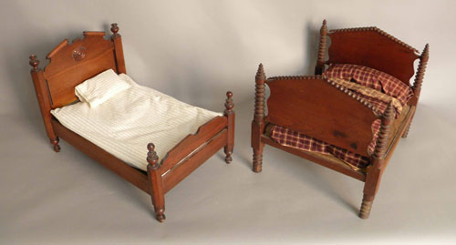 Appraisal: Two Victorian doll beds h w d and h w