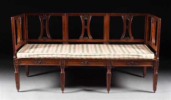 Appraisal: Italian carved walnut cane seat settee th century scroll and