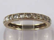 Appraisal: A white metal tests carat gold rose cut diamond eternity