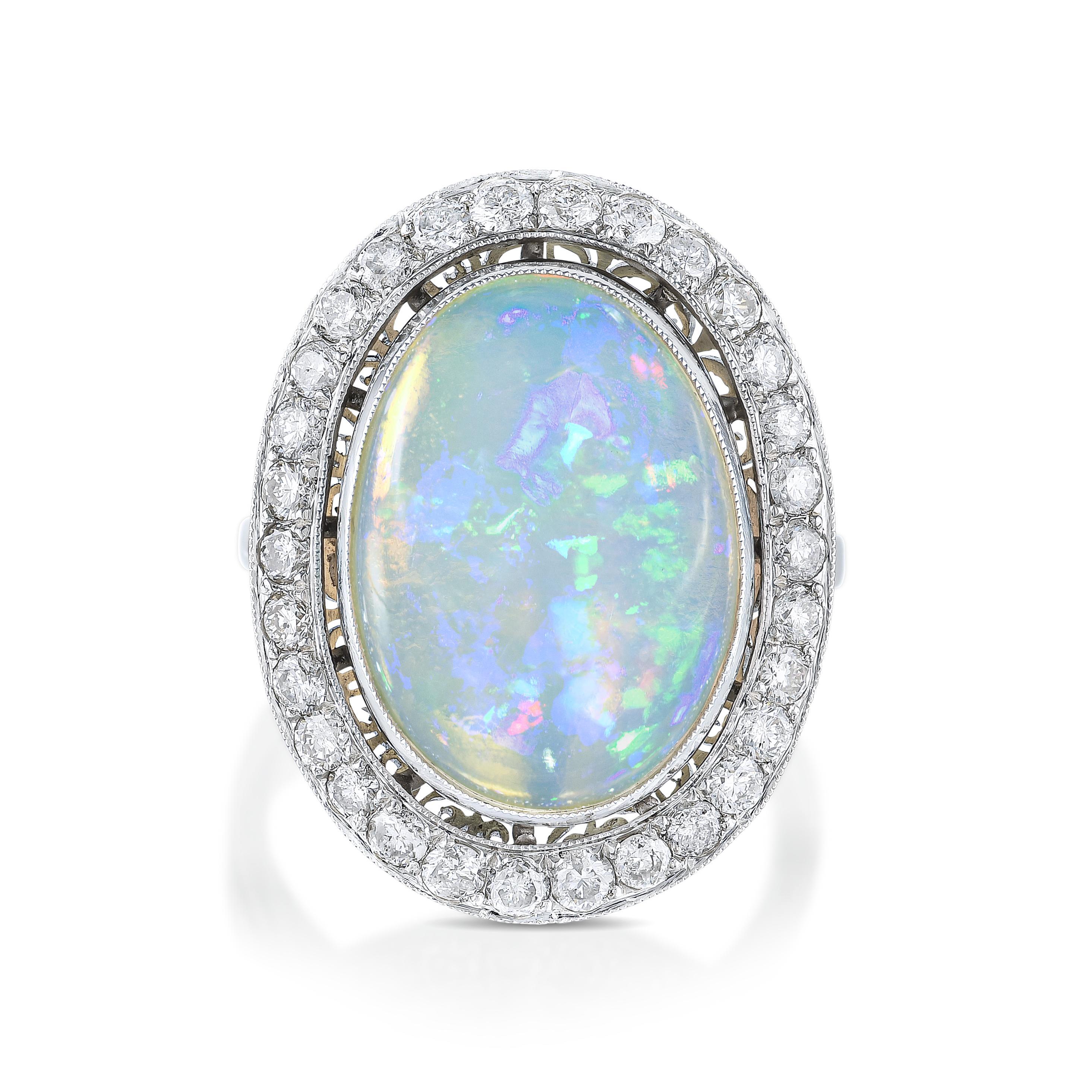 Appraisal: OPAL AND DIAMOND RING METAL platinum GEMSTONE S oval cabochon