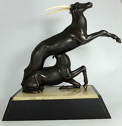 Appraisal: Art deco bronze Ivory figure of Antelopes on Alabaster base