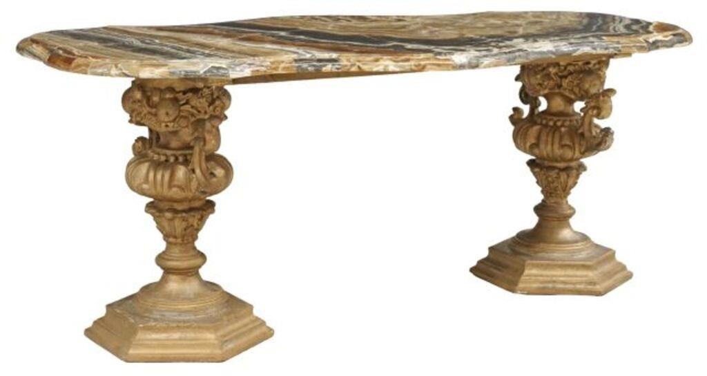 Appraisal: Italian giltwood coffee table th c shaped onyx top over