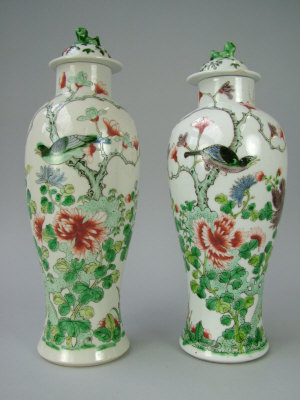 Appraisal: A pair of Chinese Famille Verte lidded baluster vases th