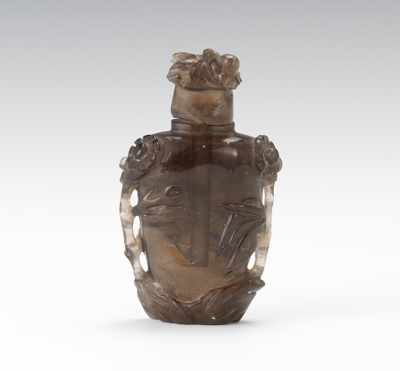 Appraisal: A Smokey Quartz Carved Snuff Bottle Carved with open-work branches